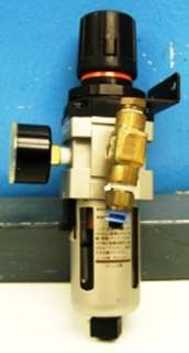 What you are bidding on is a SMC Filter Regulator AW3000 in nice 