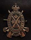 Canadian land armed forces metal infantry cap badge QC  