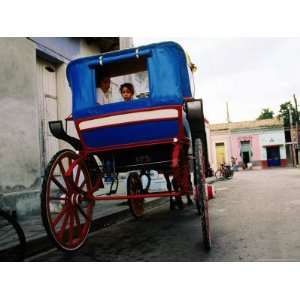  Girl in Horse Drawn Carriage Taxi, Parque Cespedes, Bayamo 