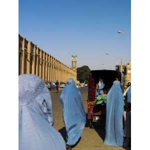  Ladies Wearing Blue Burqas Shop at Street Market Outside 