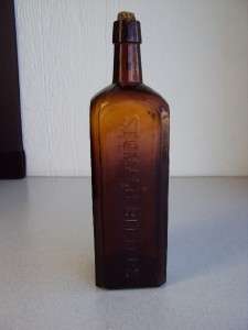 Severas Stomach w/ Original Label Bitters Bottle 10 tall Amber 