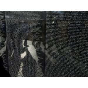  Shadows Reflected on the Wall of the Vietnam Memorial Travel 