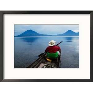  Man on Canoe in Lake Atitlan, Volcanoes of Toliman and San 