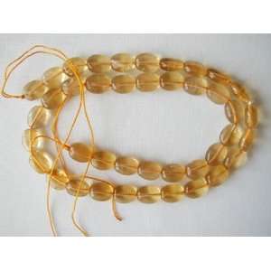  12mm yellow fluorite flat oval beads 16 strand