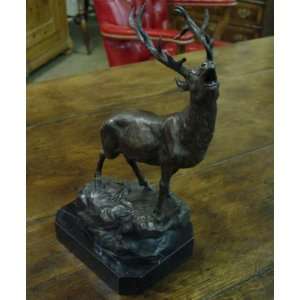  Deer Stag on Rock Sculpture: Home & Kitchen