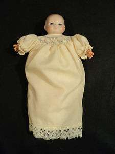   MINIATURE ANTIQUE 6 1/2 BISQUE HEAD BYE LO BABY DOLL, c.1920s
