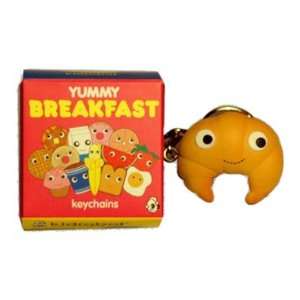    Kidrobot Yummy Breakfast Keychain   Croissant Toys & Games