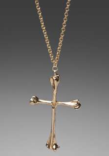 LOW LUV X ERIN WASSON Bone Cross Necklace in Gold  