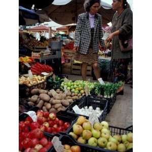  Produce Vendor Selling Vegetables at Farmers Market 