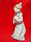 lladro little girl with pony tail holding kitten expedited shipping