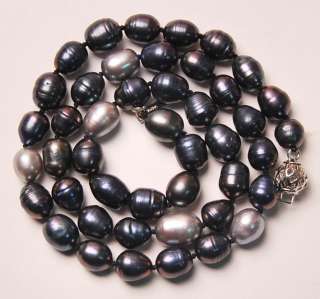This is a stunning 18 TAHITIAN NATURAL COLOR PEARL necklace . The 