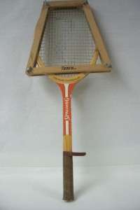 This auction is for a Vintage Spalding Rosie Casals Wood Tennis Racket