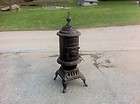 VINTAGE ANTIQUE ROUND OAK D14 POT BELLY STOVE PD BECKWITH 55 TALL 